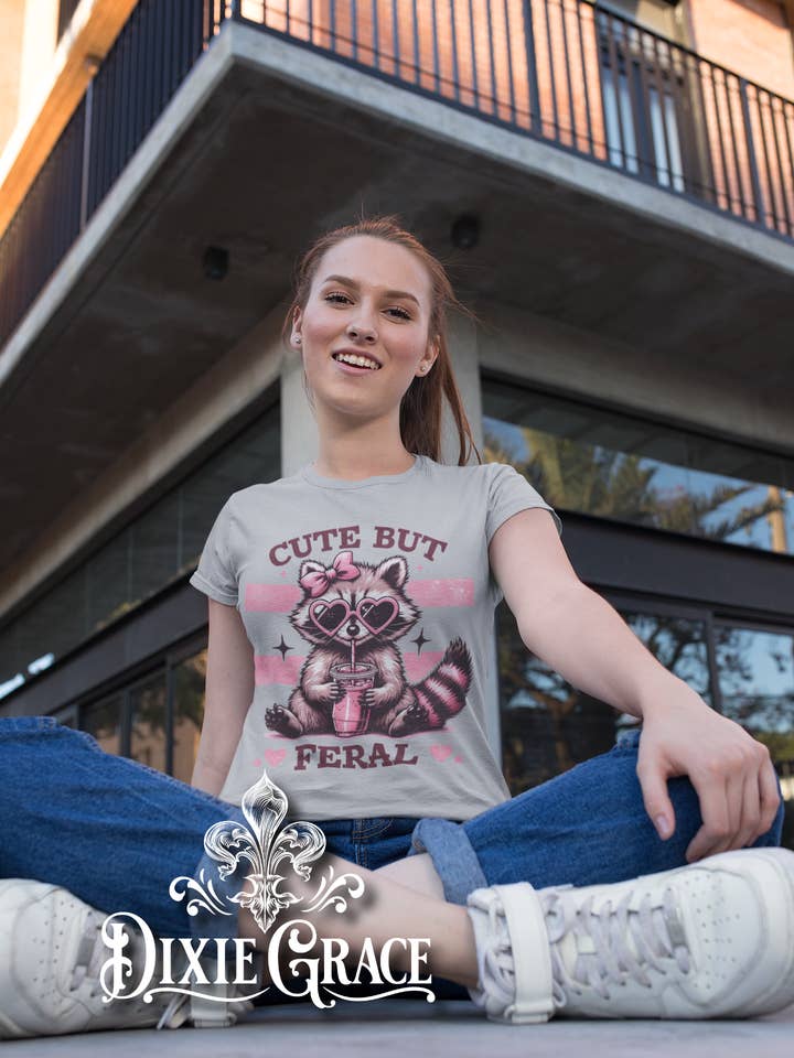 Cute But Feral - Solid Athletic Gray - Youth, Tank, Sweatshirt, Hoodie Option - Graphic Tee for wholesale by Dixie Grace