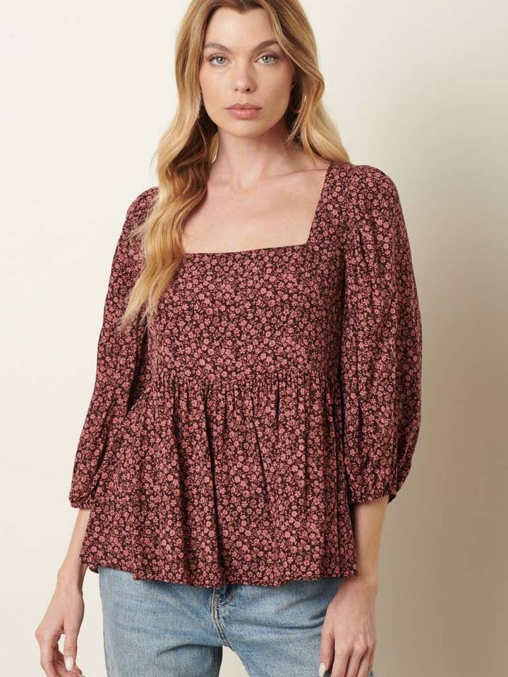 BLUSA CON STAMPA FLOREALE E DETTAGLIO CORPETTO AFFUMICATO per la vendita all'ingrosso da parte di mittoshop