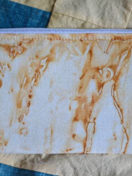 Rust Dyed Zipper Pouch for wholesale by Aaron Sanders Head Studio