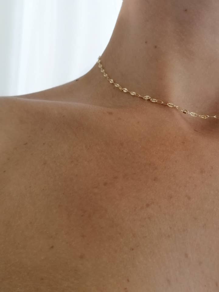 RAS-DE-COU À SPIRALE pour la vente par Noon Milan