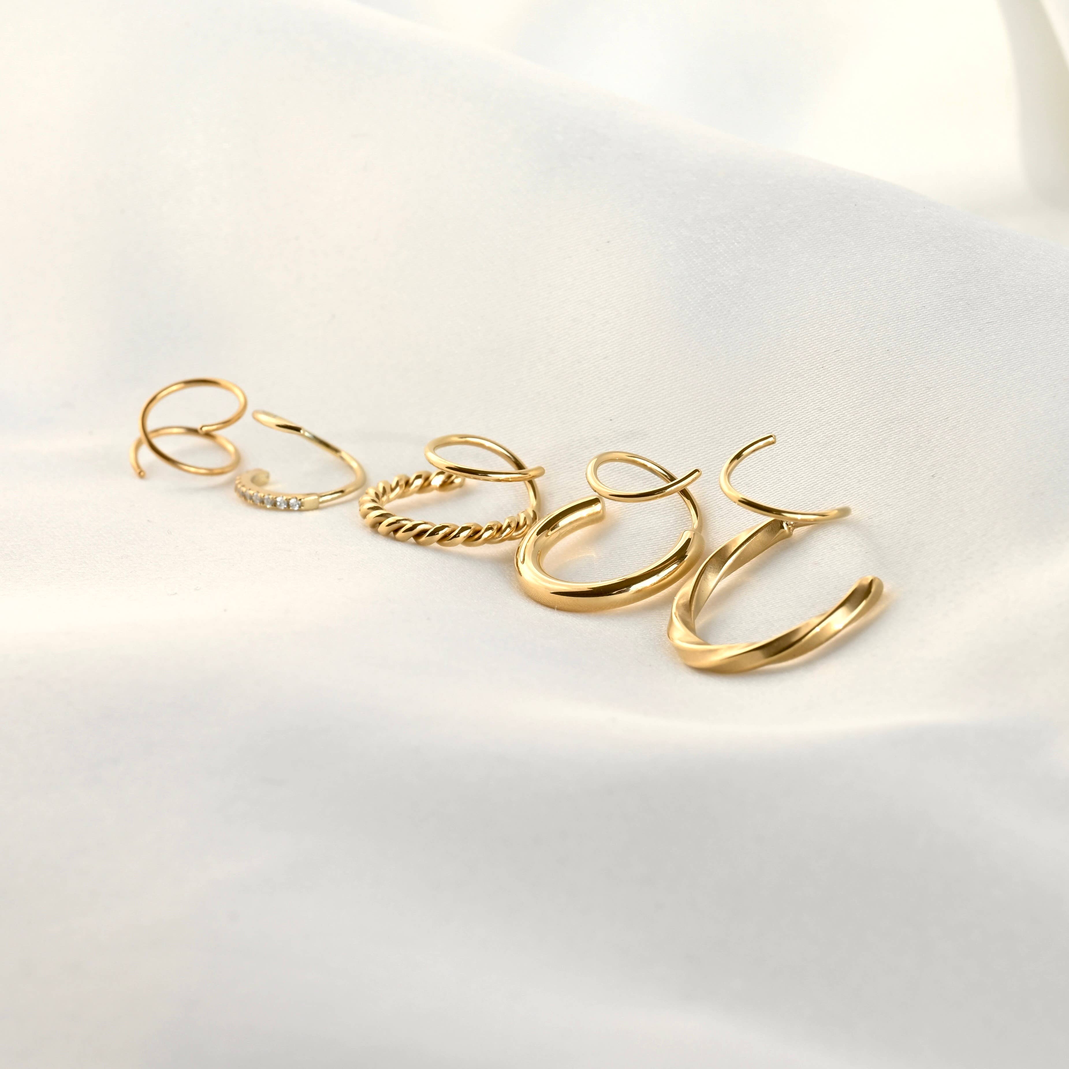 Blueyejewelry - Vendita all'ingrosso Orecchini a cerchio - Orecchini a Cerchio a Spirale Dorata - Orecchini a Torsione Impermeabili2