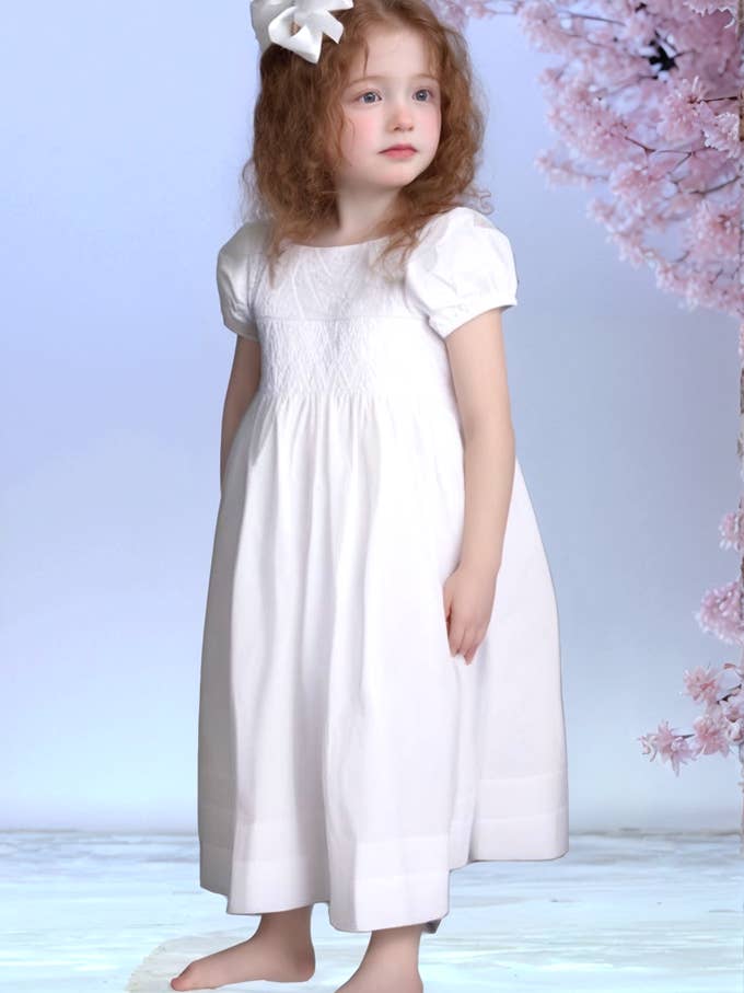 White Heirloom Smocked with Hand Embroidered Cross Dress for wholesale by Hello Bebes!