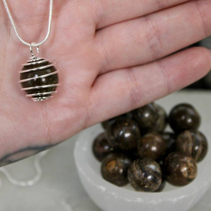 Spiral Cage Crystal Sphere Necklace – Pick Your Crystal: Lapis, Quartz, Howlite, Bloodstone, Bronzite, Obsidian, Brecciated Jasper– Healing Stone Pendant for wholesale by EC Plugs and Gems