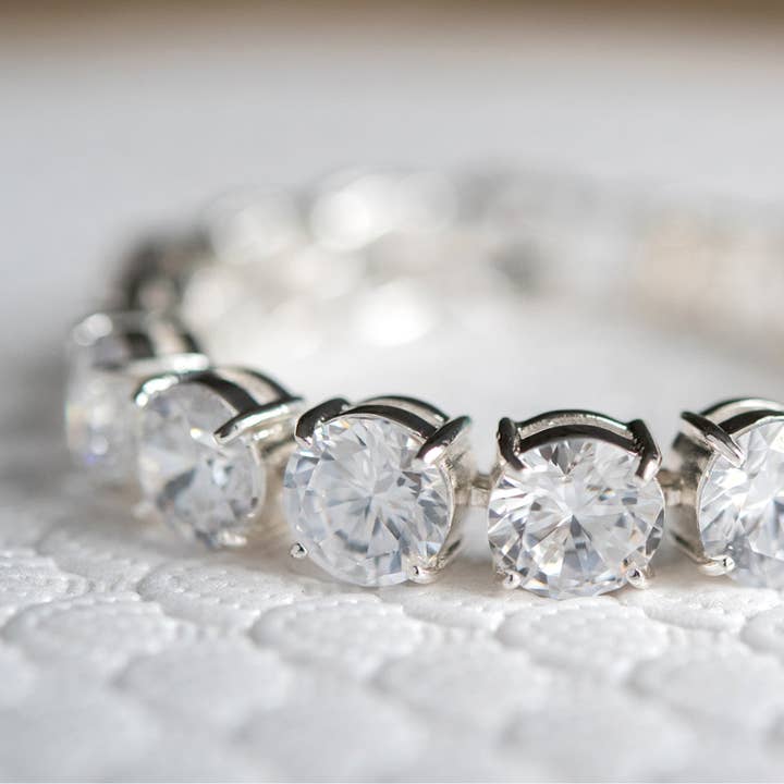 Elegant Round Cut Cubic Zirconia Tennis Bracelet 7 Inch Silver Tone Special Occasion Jewelry for wholesale by LookLove Jewelry