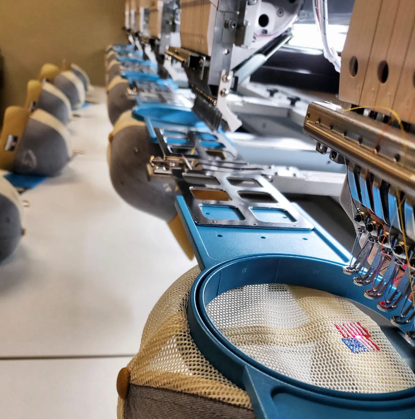 Mad River – wholesale Trucker hat – Unisex – "Retro Wave" Cap with Custom Text. R112 Loden/Blk Center6