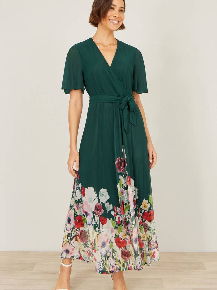 Yumi Green Mesh Wrap Midi Dress With Floral Hem Border for wholesale by Yumi