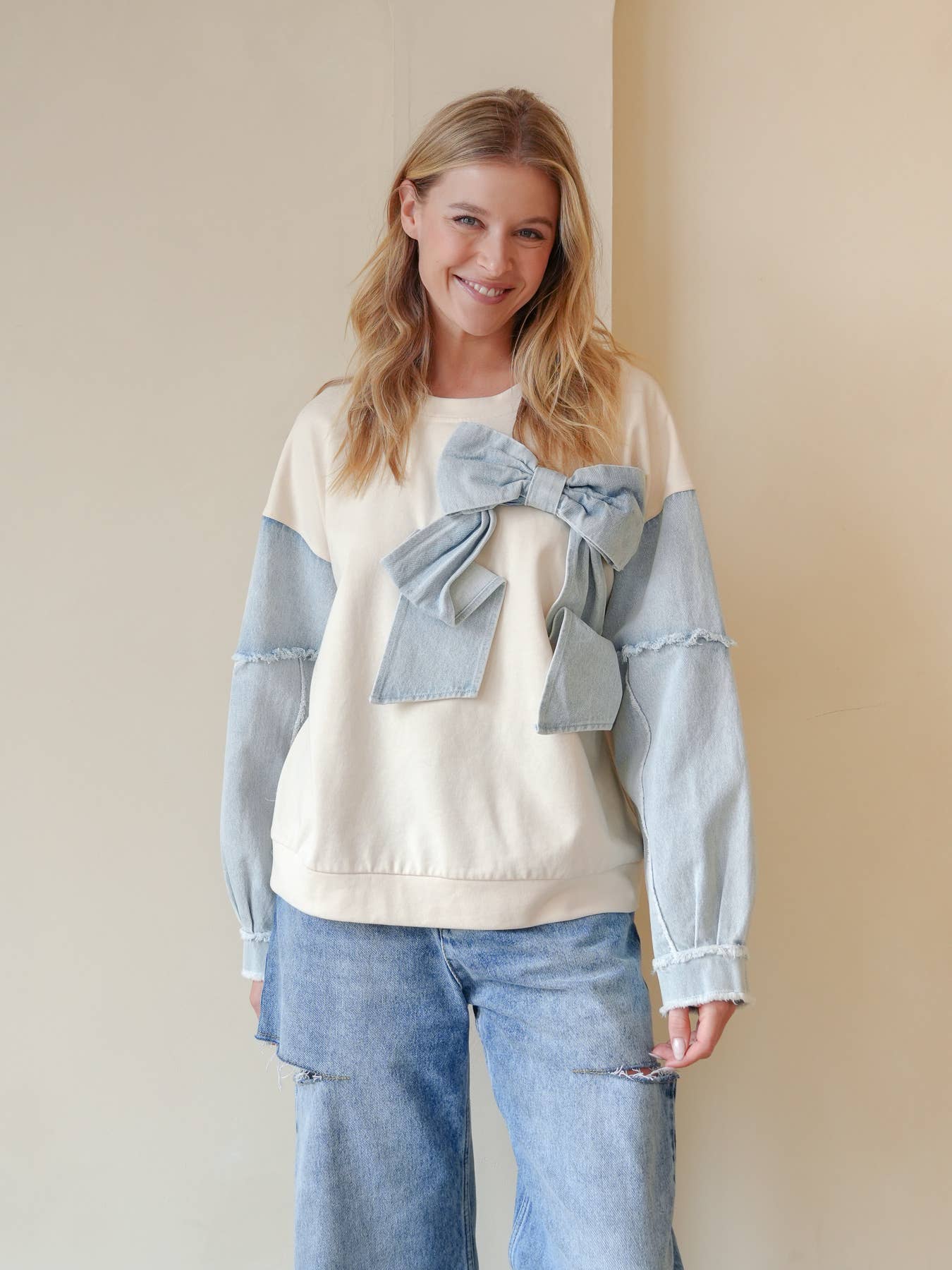 TRENDILITY - Wholesale Sweatshirt - Women's - TR2027-04_Mineral Washed Denim Bow Sweatshirt Top2