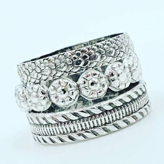 Abstract layering rings for wholesale by Nevermore Fine Jewelry