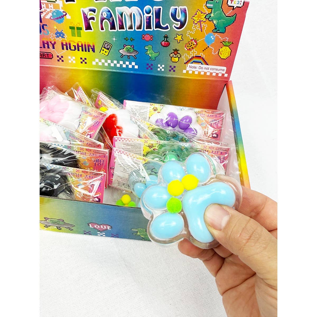 MIX COLOR Addicting Paw Pinch Squishy Toy for wholesale on Faire1