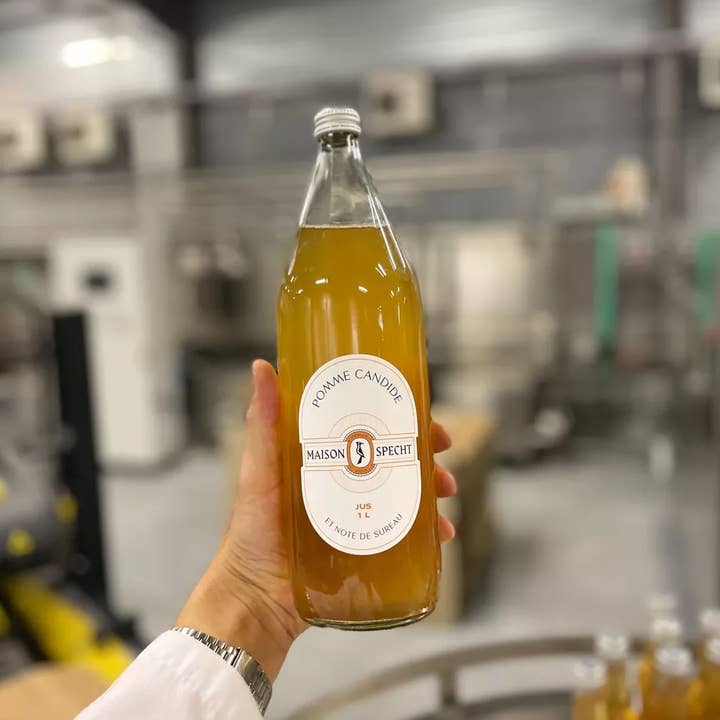 Succo di Mela candido e nota di Sambuco - Bottiglia 1L per la vendita all'ingrosso da parte di Maison Specht