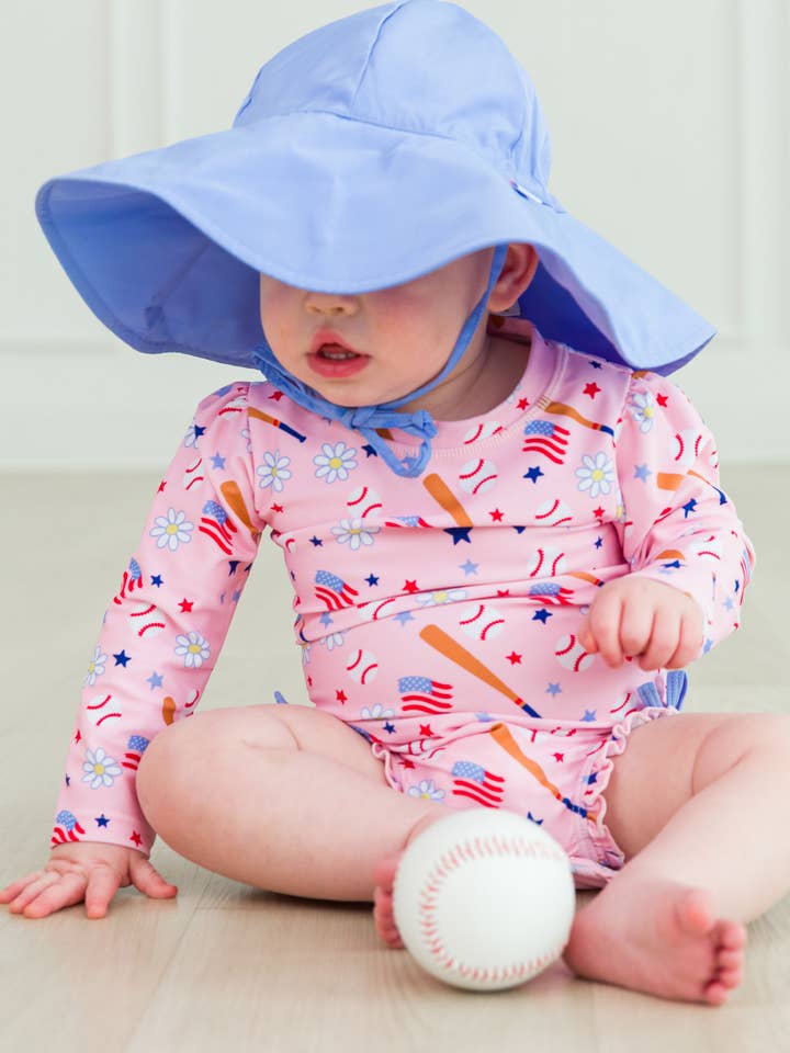 Baby Girls Pink Play Ball Long Sleeve One Piece Rash Guard Swimsuit with Signature Rear Ruffles
for wholesale on Faire