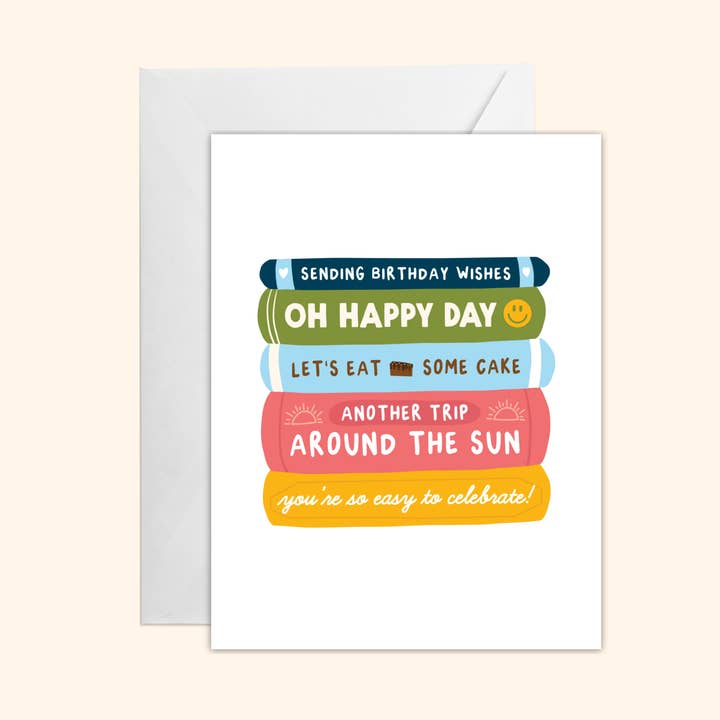 Carte de vœux pile de livres d'anniversaire pour la vente par Oh Happy Dani