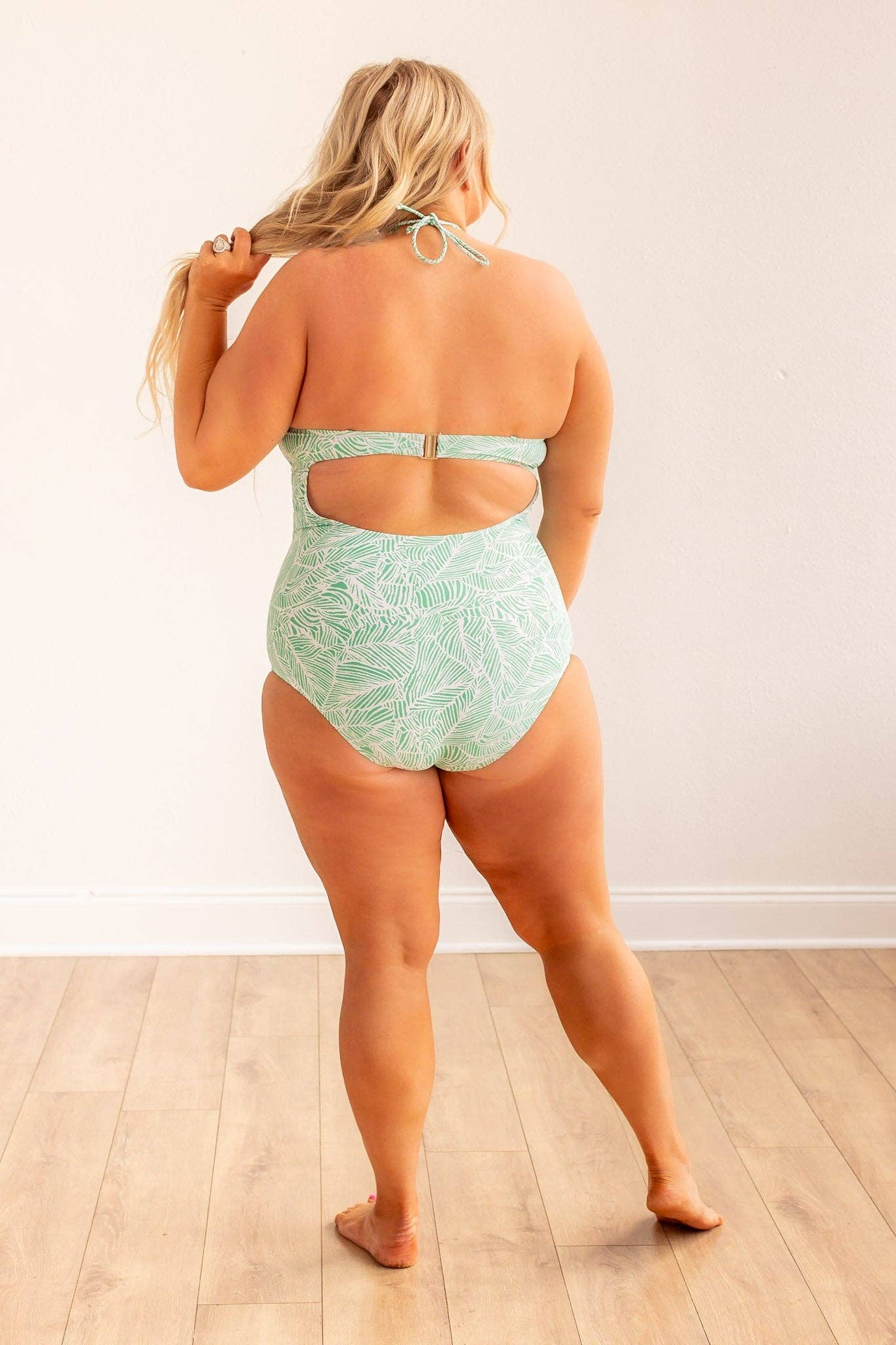 Green Jungle Oasis One Piece Swimsuit with Handcrafted Beaded Necktie for wholesale on Faire8