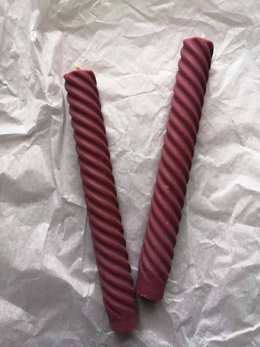 Spiral taper candle (Deep Orchid) for wholesale by Silke-Amsterdam