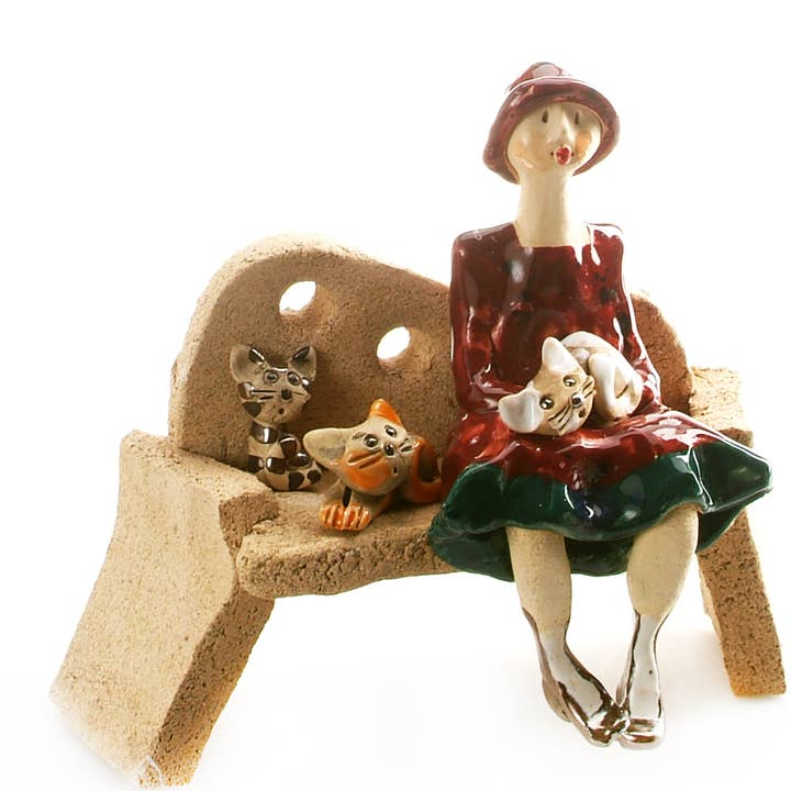 Crazy Cat Lady Figurine with 3 Random Cats Sitting on Bench for wholesale by Art In Ceramic