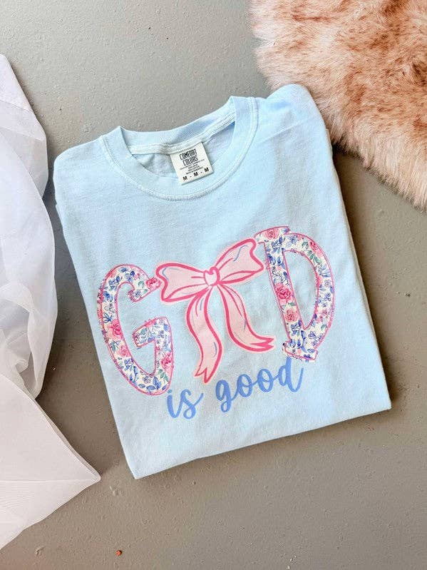 Camiseta Gráfica DTF com Laço Floral "Deus é Bom" por atacado de Dash Forward Wholesale