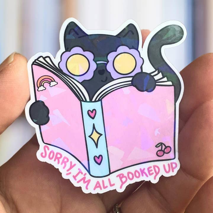All Booked Up Cat Lovers Holographic or Glossy Vinyl Sticker for wholesale by Cheeky Chick Sticker Co.