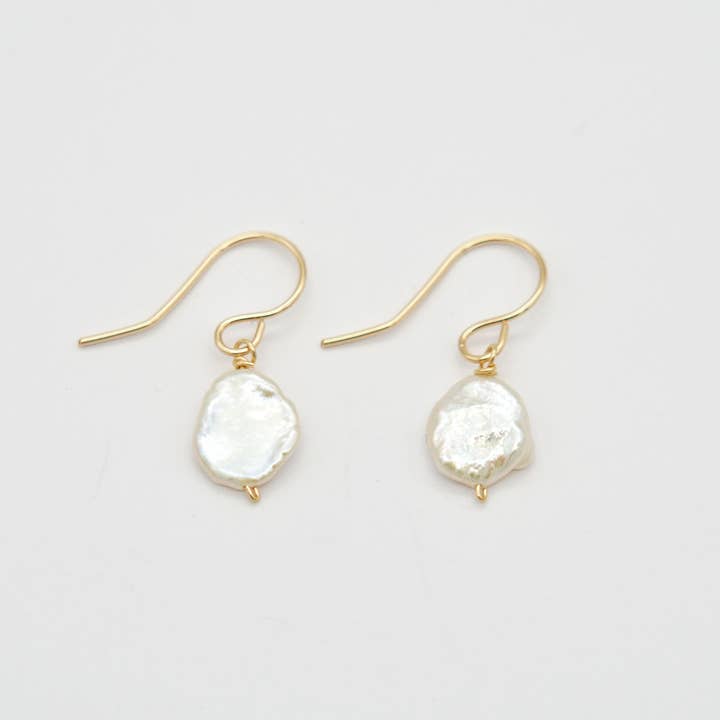 Simple gold earrings with a keshi pearl for wholesale by Sista Jewelry