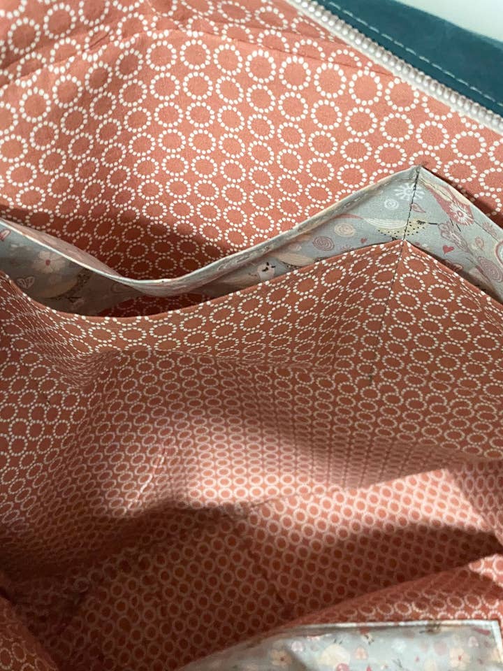 Oilskin backpack in teal rose with leather stripes for wholesale by Frau Schmetterling