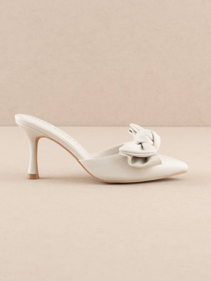 The Jane | White Pointed Toe Bow Accent Kitten Heel for wholesale on Faire