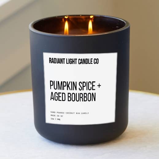 Pumpkin Spice + Aged Bourbon Scented 12oz Black Glass Candle for wholesale by Radiant Light Inc