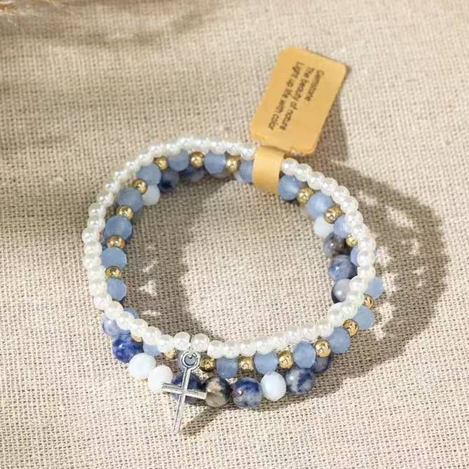 Cute Blue and White Cross Stackable Bracelet Christian for wholesale by Purple Myrtle
