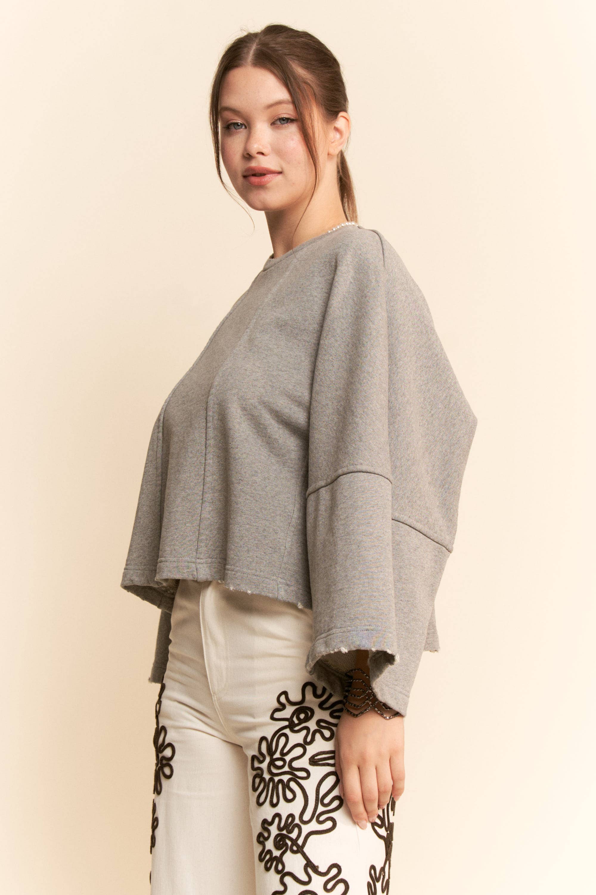 Heather Grey OVERSIZED BELL-SLEEVE RAW HEM SWEATSHIRT for wholesale on Faire4