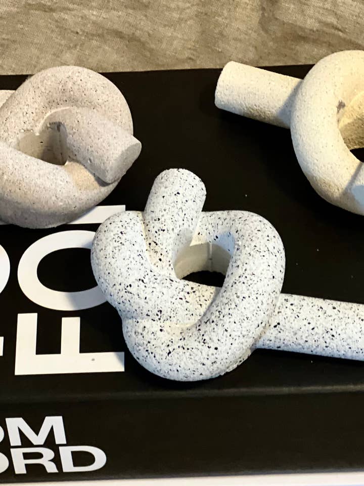 Knot stone candle holder for wholesale by EMB Pretty