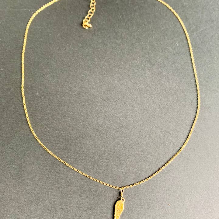 Collana con ciondolo ala d'angelo per la vendita all'ingrosso da parte di Rafia