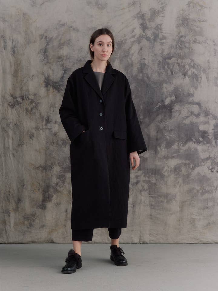 Manteau noir pour la vente par muku