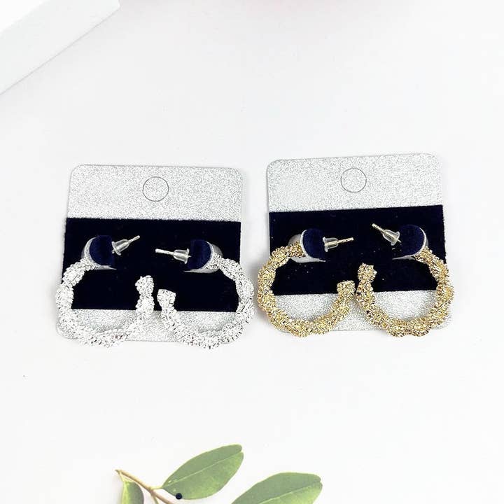 ASSORTED TWISTED METAL ROUND HOOP EARRING for wholesale on Faire0