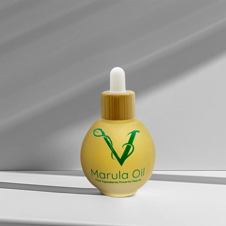 Shine-enhancing, frizz-smoothing hair oil for wholesale by VitaHair