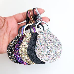Purchase Wholesale keychain charms. Free Returns & Net 60 Terms on Faire