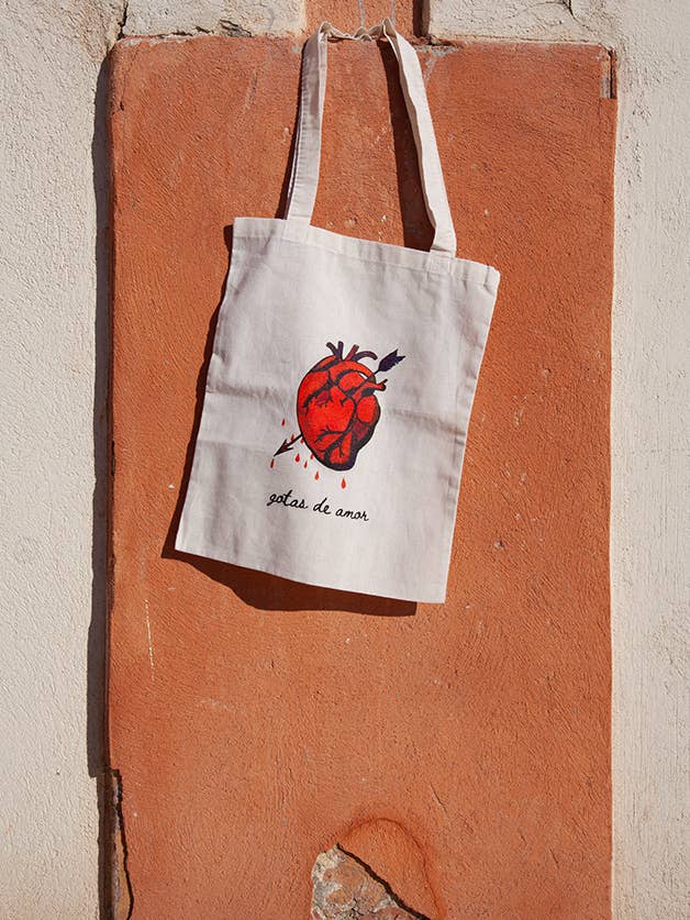 Tote sérigraphié popular culture - gotas de amor pour la vente par Tienda Esquipulas distribution