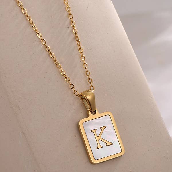 JOSSLYN by wall to wall - Wholesale Pendant/Charm Necklace - MOP INITIAL STAINLESS STEEL TARNISH FREE NECKLACE | 40NK31417