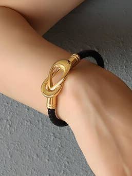 J-18K GOLD PLATED STAINLESS STEEL BRACELET,WITH FUAX LEATHER for wholesale by Trendi Lady