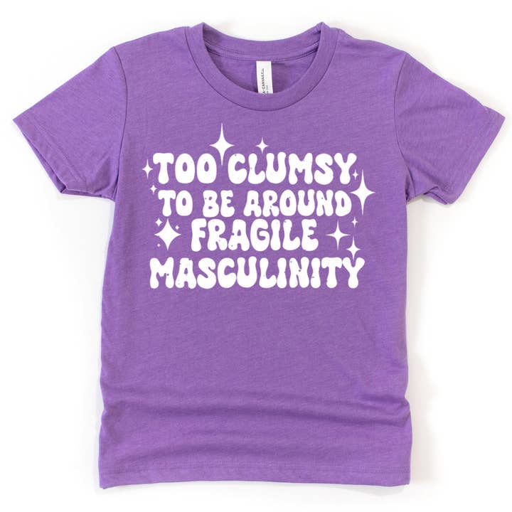 Too Clumsy To Be Around Fragile Masculinity - Maglietta unisex per adulti per la vendita all'ingrosso da parte di Naked Mangoes