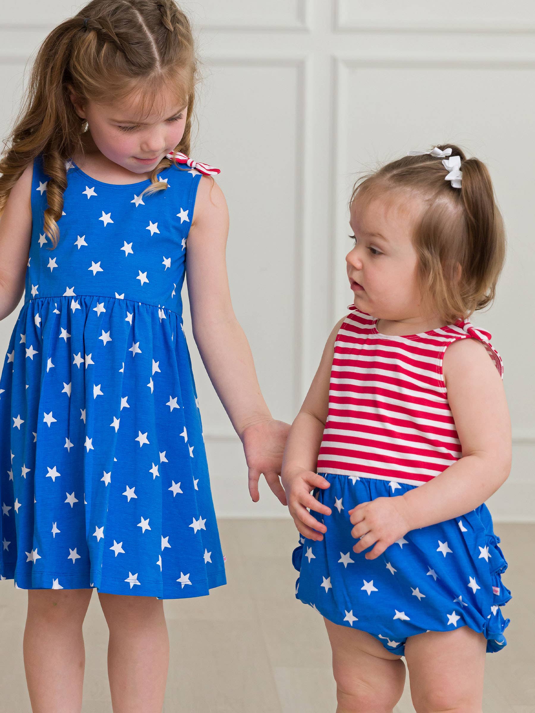 RuffleButts + RuggedButts - Wholesale Romper - Kids - Baby Girls Stars & Stripes Knit Tie Shoulder Bubble Romper6
