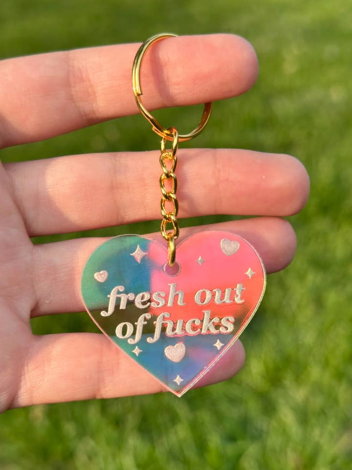 Fresh Out Of Fucks Iridescent Acrylic Keychain for wholesale by ShlemonArt