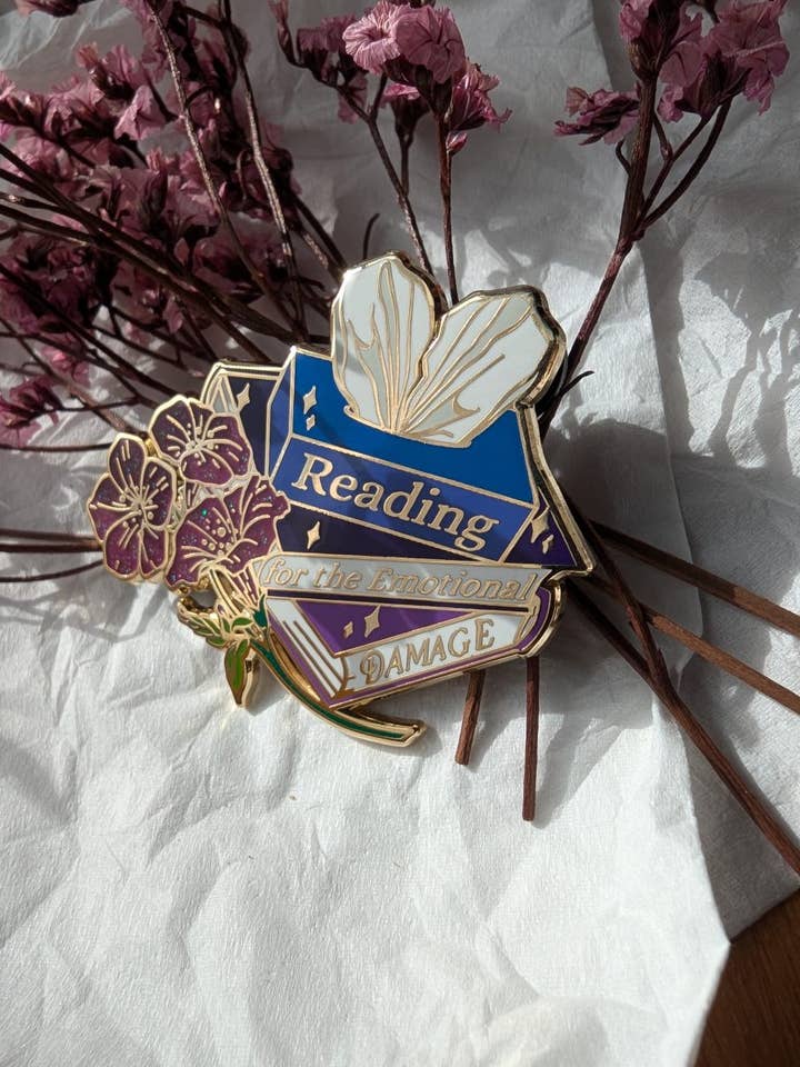 Reading for the emotional damage enamel pin for wholesale by Geek and Artsy