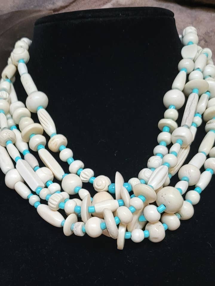 1 Handcarved Bison Bone necklace with Turquoise glass beads for wholesale by Horse Spirit Studio