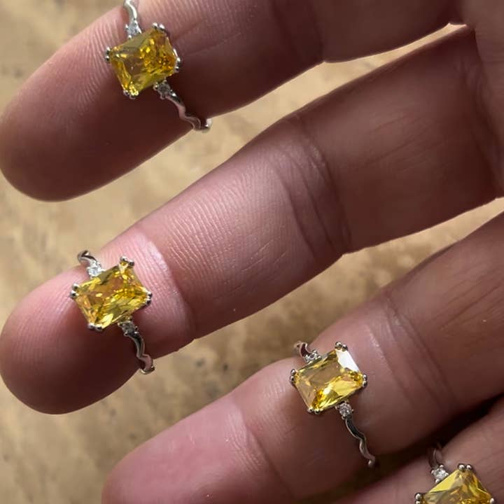 Ladies silver & gold rings in assorted crystals & sizes for wholesale by Siman International Inc.