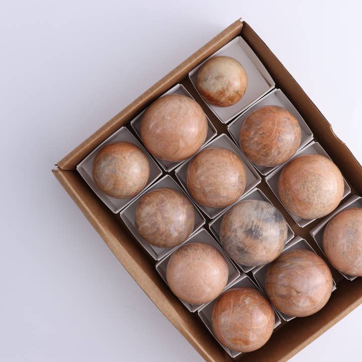 Peach Moonstone Spheres Set of 12 for wholesale by Mi Esperanza Minerals