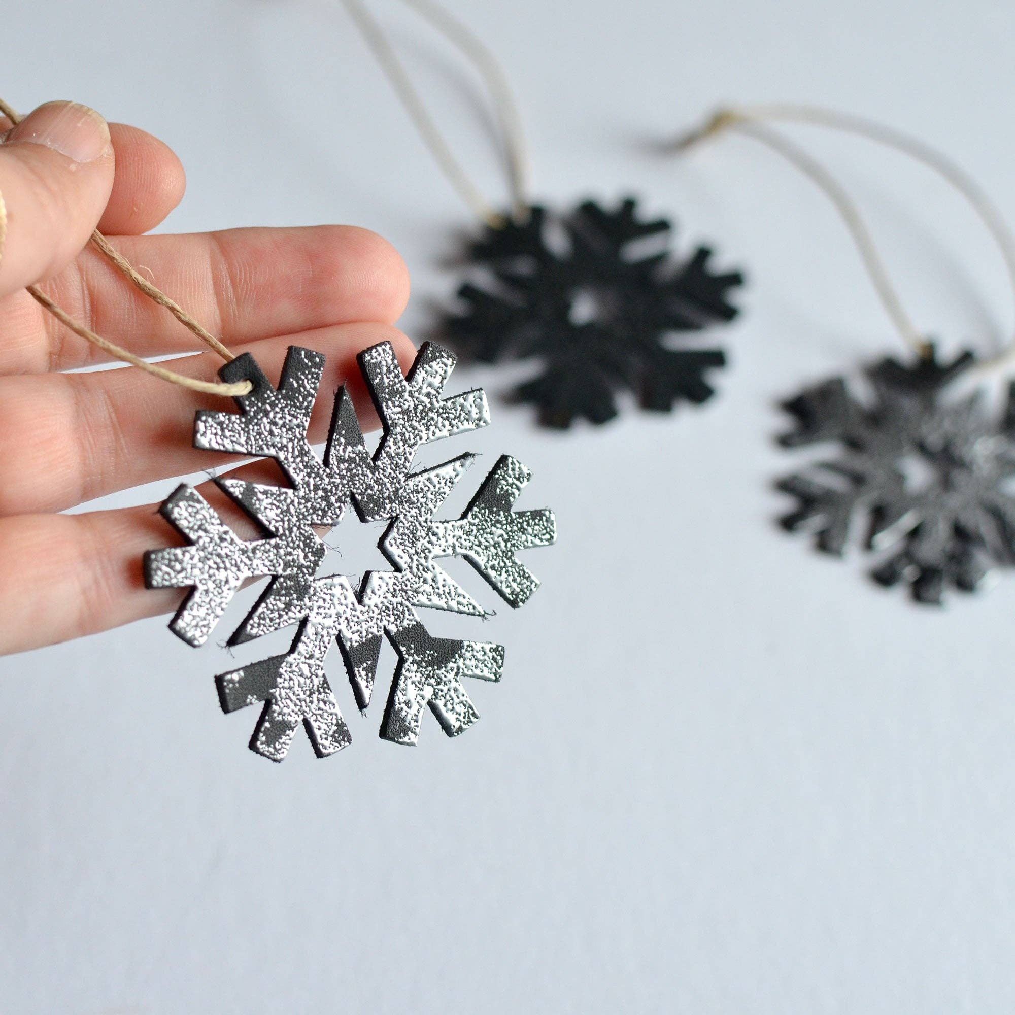 Moss Bags - Wholesale Ornament Set - Leather Snowflake Ornament Box Set: 4 Leather Snowflake Ornaments + 1 Christmas Card4