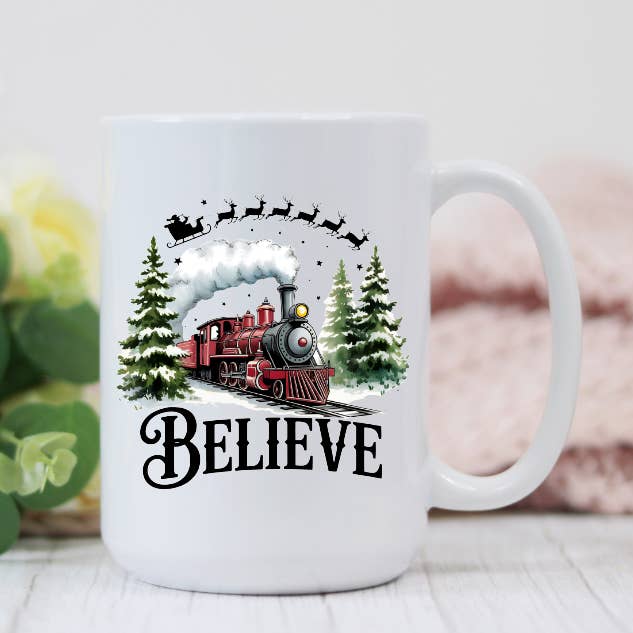 Christmas Believe Train 15oz Coffee Mug for wholesale by Prairie Chicken Sticker Shop & Gifts