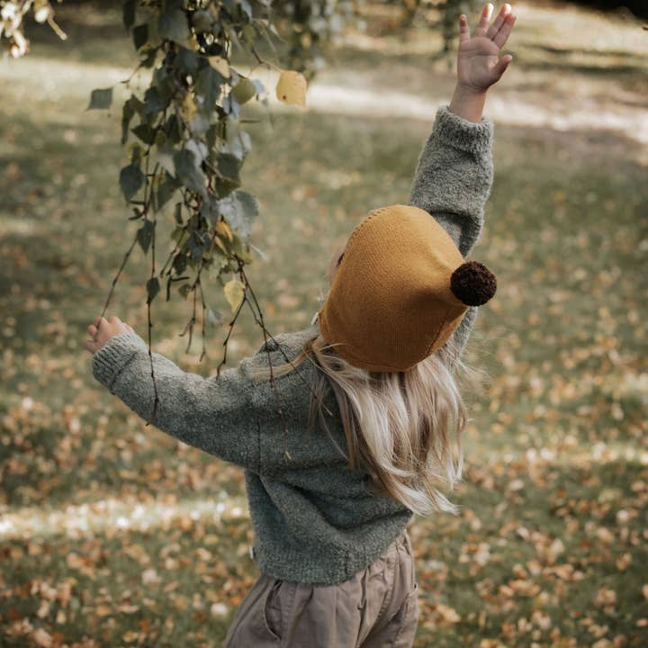 Bonnet bébé à pompon en coton tricoté Annie & Charles® pour la vente par Annie & Charles