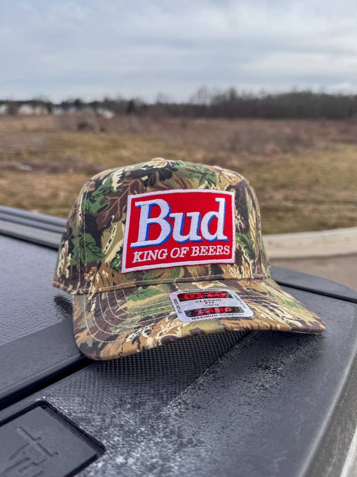 BUD (King of Beers) Camo Signature for wholesale by River Bent Hat Co.