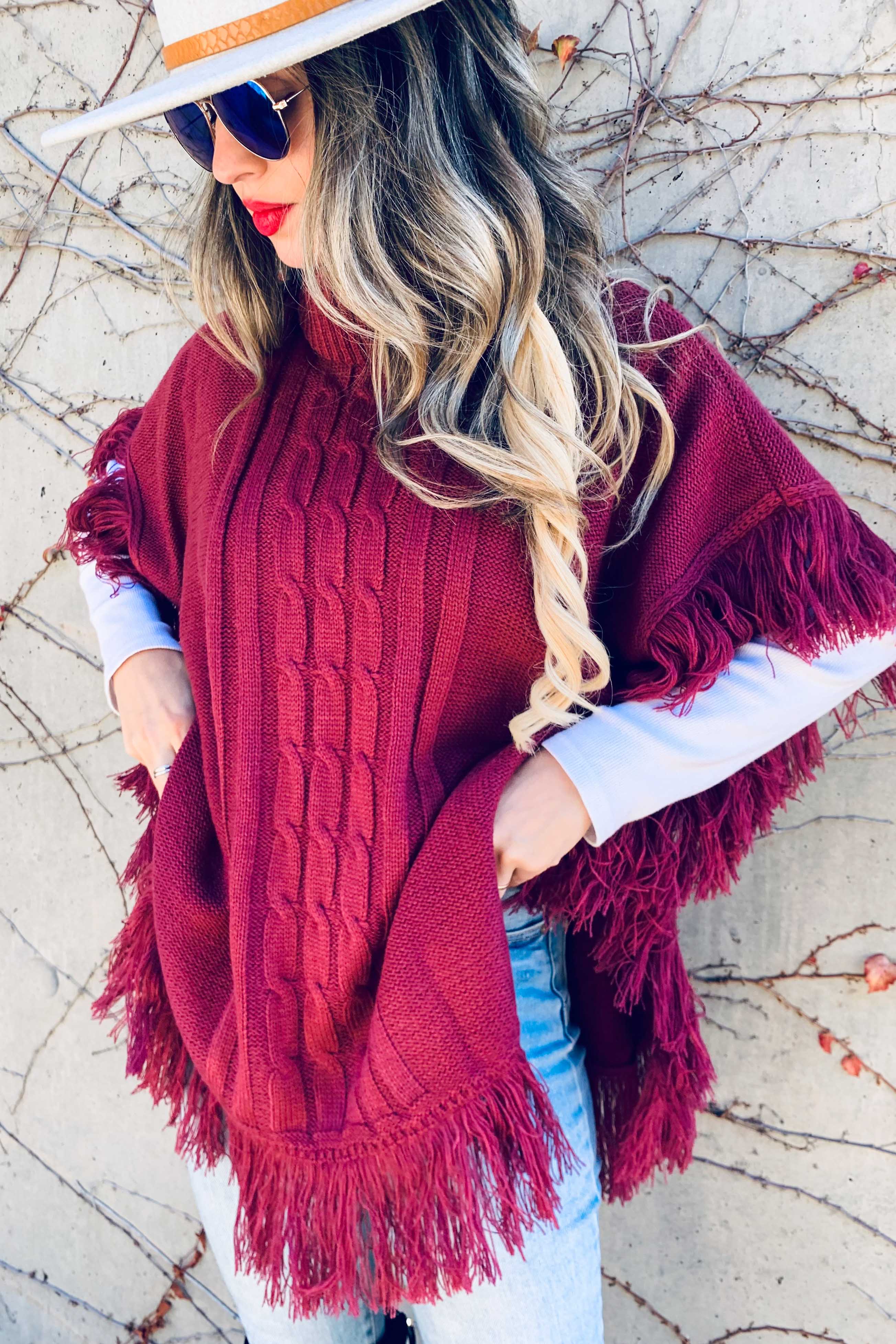 Berry Poncho a tunica in maglia a tunica con frange Berry in vendita all'ingrosso su Faire3