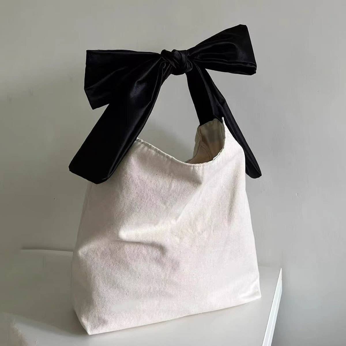 IVORY CWAB4839_BOW SHOPPING BAG SHOULDER BAG for wholesale on Faire0