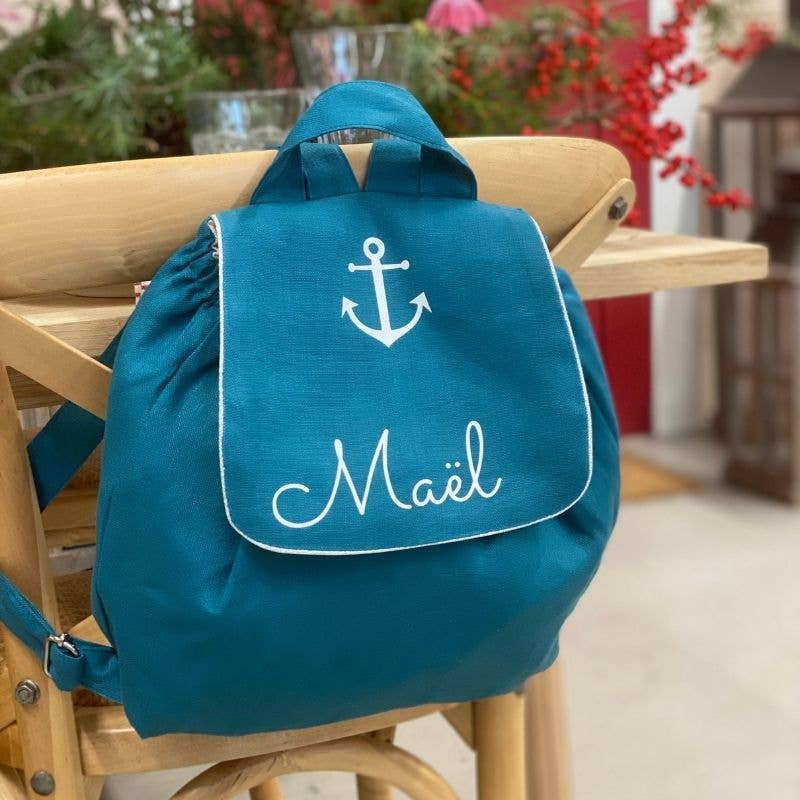 oh la la paris - Wholesale Backpack - Kids - “Little Dreamer” peacock blue linen backpack with heart symbol1